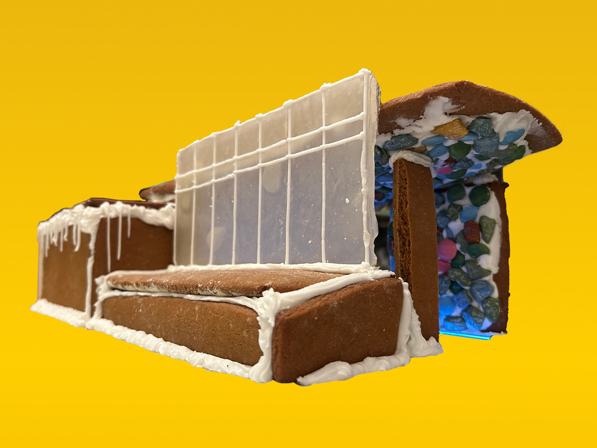 A subway station made of gingerbread with a candy mosaic.